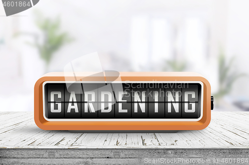 Image of Gardening alarm message in a bright room in the spring