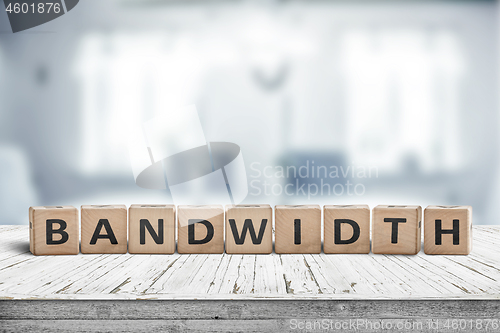 Image of Bandwidth sign in a living room on a wooden desk