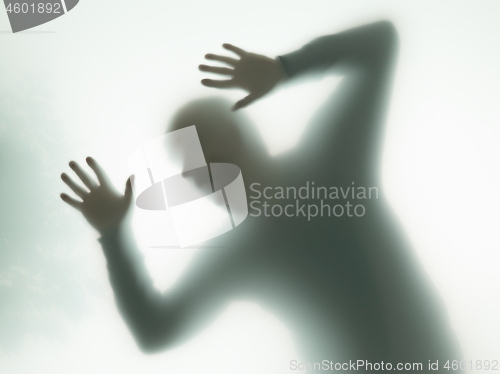 Image of dramatic silhouette of man