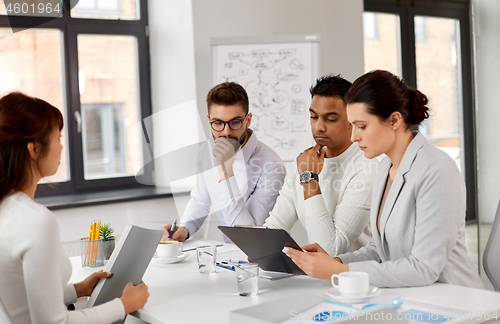 Image of recruiters having job interview with employee