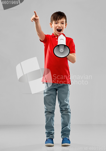 Image of little boy in red polo shouting to megaphone