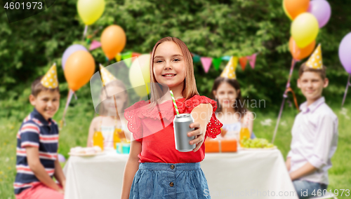 Image of smiling girl with can drink at birthday party