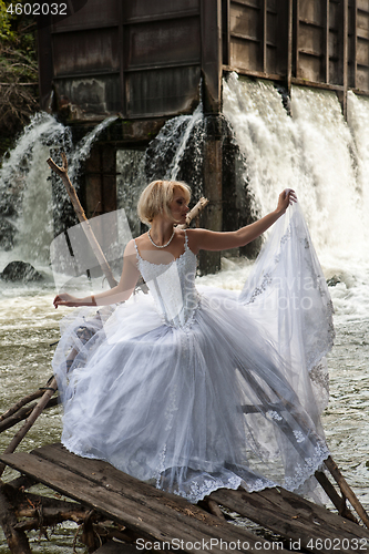 Image of Young Bride On A River