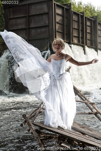 Image of Young Bride On A River