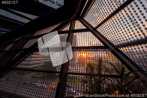 Image of sunset through a glass roof