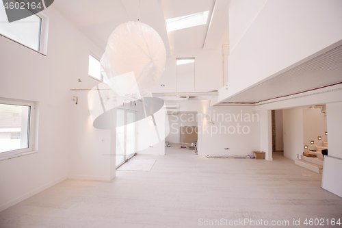 Image of Interior of empty stylish modern open space two level apartment