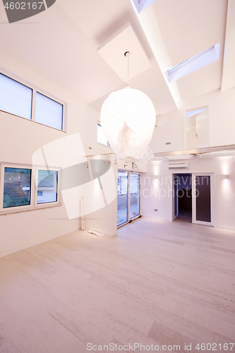 Image of Interior of empty stylish modern open space two level apartment