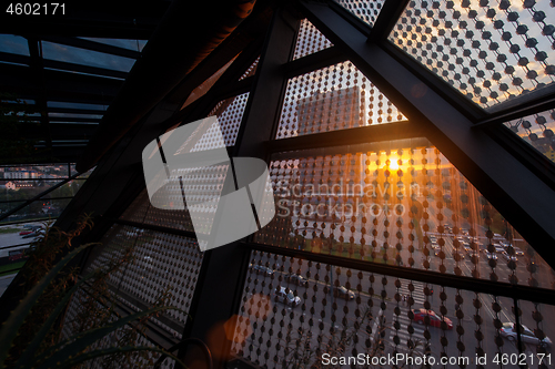 Image of sunset through a glass roof