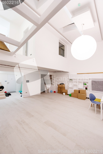 Image of Interior of empty stylish modern open space two level apartment