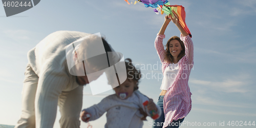 Image of Young family enjoying vecation during autumn