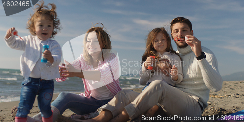 Image of Young family enjoying vecation during autumn