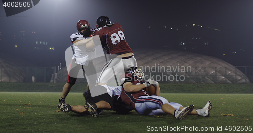 Image of American football players in action