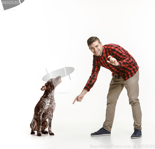 Image of Emotional Portrait of a man and his dog, concept of friendship and care of man and animal