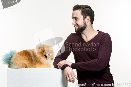 Image of Emotional Portrait of a man and his dog, concept of friendship and care of man and animal