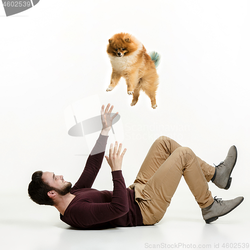 Image of Emotional Portrait of a man and his dog, concept of friendship and care of man and animal