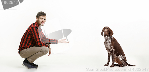 Image of Emotional Portrait of a man and his dog, concept of friendship and care of man and animal