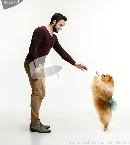 Image of Emotional Portrait of a man and his dog, concept of friendship and care of man and animal