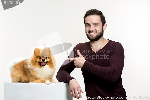 Image of Emotional Portrait of a man and his dog, concept of friendship and care of man and animal