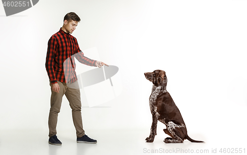 Image of Emotional Portrait of a man and his dog, concept of friendship and care of man and animal