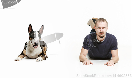 Image of Emotional Portrait of a man and his shepherd dog, concept of friendship and care of man and animal