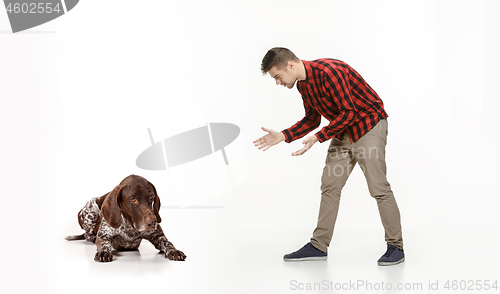 Image of Emotional Portrait of a man and his dog, concept of friendship and care of man and animal