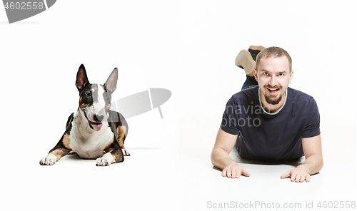 Image of Emotional Portrait of a man and his shepherd dog, concept of friendship and care of man and animal