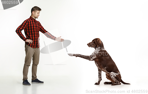 Image of Emotional Portrait of a man and his dog, concept of friendship and care of man and animal