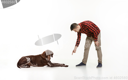 Image of Emotional Portrait of a man and his dog, concept of friendship and care of man and animal