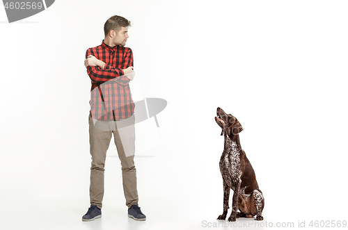 Image of Emotional Portrait of a man and his dog, concept of friendship and care of man and animal