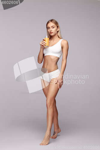 Image of Perfect slim toned young body of the girl .
