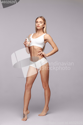 Image of Perfect slim toned young body of the girl .