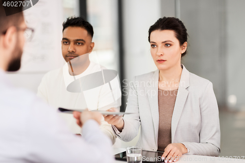 Image of recruiters having job interview with employee