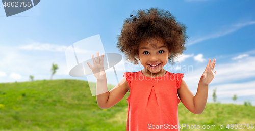 Image of happy little african american girl in summer