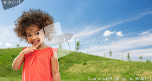 Image of happy little african american girl in summer