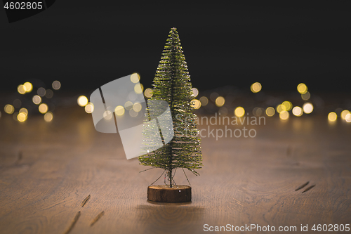 Image of Christmas tree decoration on a wooden surface