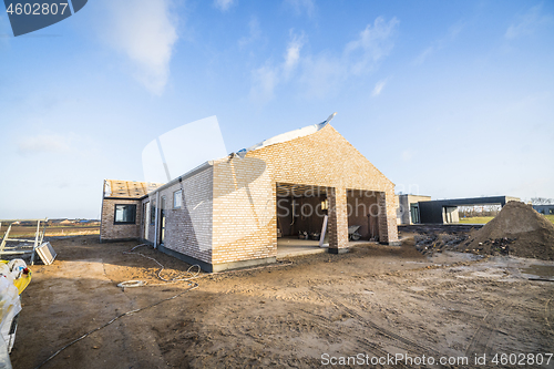 Image of Brick house construction site in a new neighborhood