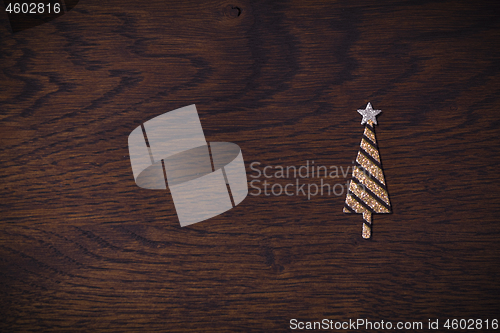 Image of Golden Christmas tree with glitter