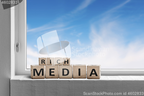 Image of Rich media sign written on wooden blocks