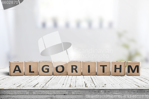 Image of Algorithm word on a wooden sign made of blocks