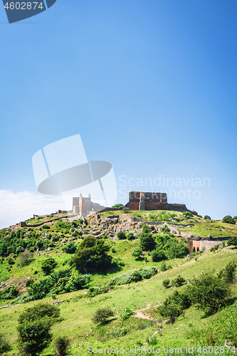 Image of Castle ruin in a green landscape