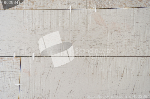 Image of Ceramic wood effect tiles and tools for tiler on the floor