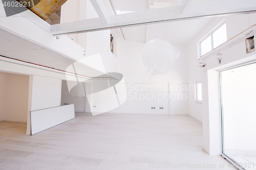 Image of Interior of empty stylish modern open space two level apartment