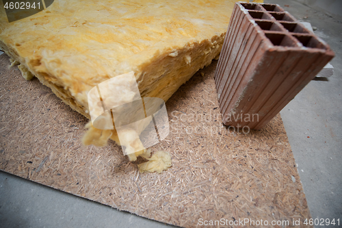 Image of red Bricks and glass wool