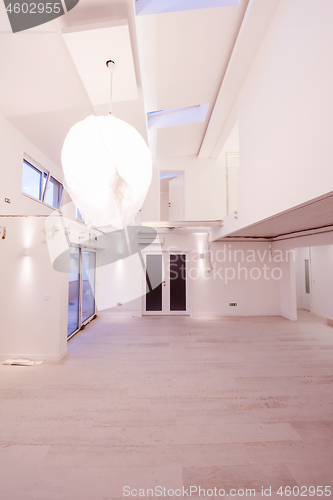 Image of Interior of empty stylish modern open space two level apartment