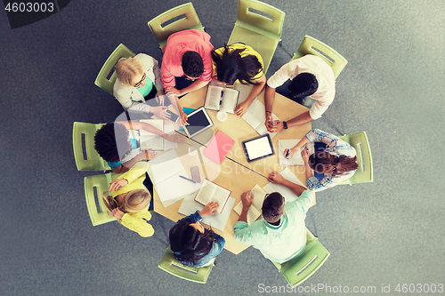 Image of group of students with tablet pc at school library