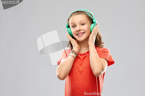 Image of happy teenage girl with headphones