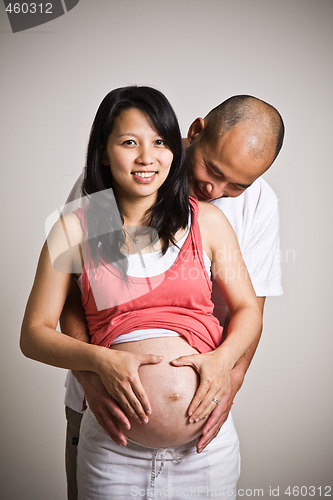 Image of Pregnant asian couple baby