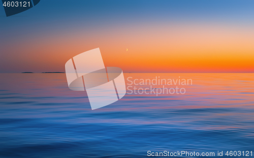 Image of Blue Seascape With Fiery Golden Sunset