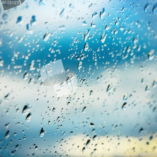 Image of Blurred Raindrops On Window Glass