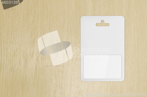 Image of Blank gift card on wooden table